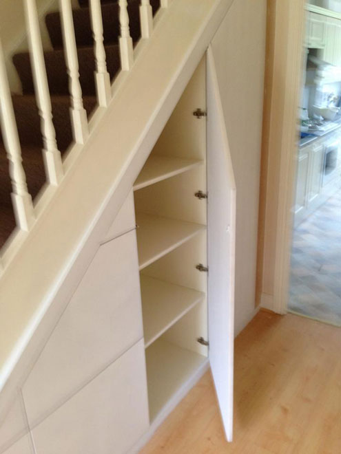 https://ingrained.ie/wp-content/uploads/2014/01/under-stairs-storage-press-with-shelving.jpg